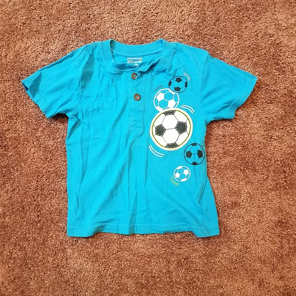 Boys turquoise blue button up soccer tee